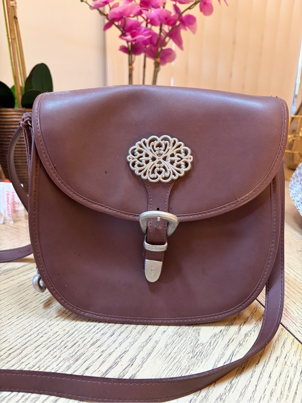 Women's Brown Leather Crossbody Bag with Floral Buckle
